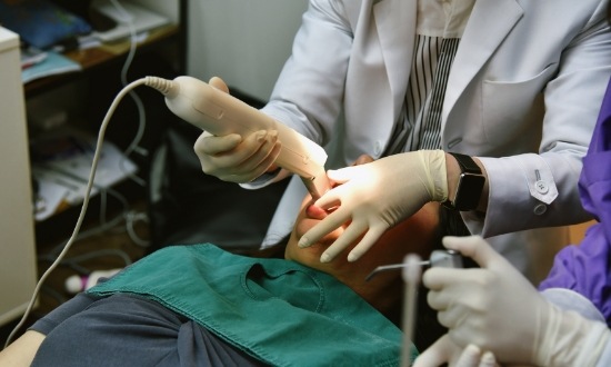 Dental patient getting digital impressions of their teeth taken