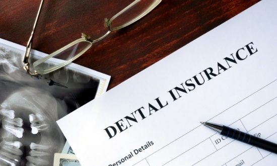 Dental insurance paperwork on a desk