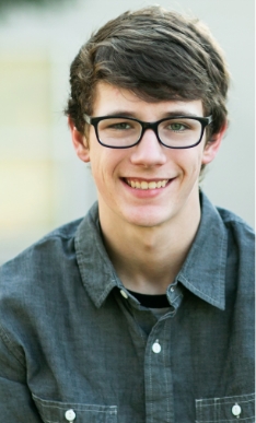 Smiling young man wearing glasses