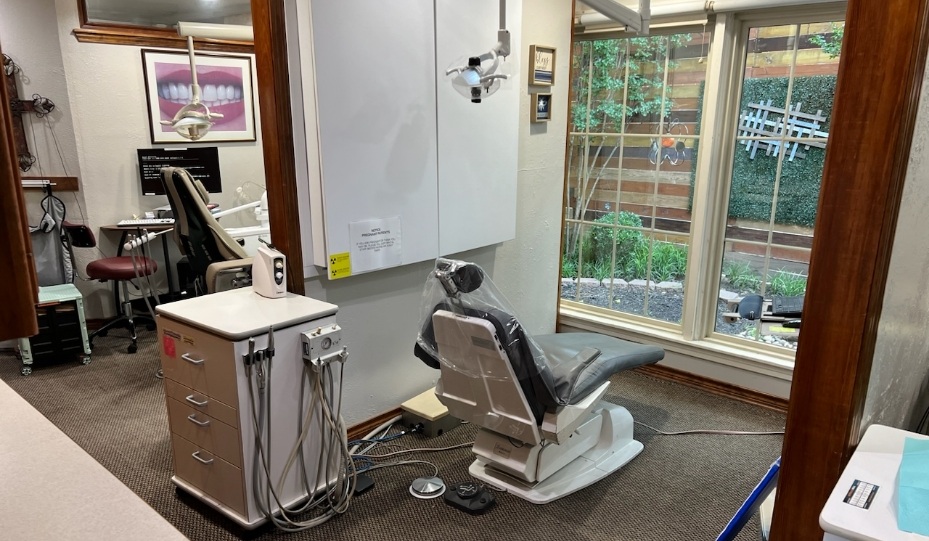 Two adjacent dental treatment rooms